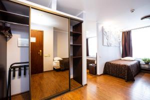 Postel nebo postele na pokoji v ubytování Primo Hotel