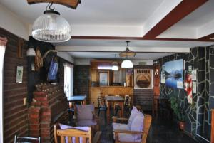 Reštaurácia alebo iné gastronomické zariadenie v ubytovaní Hostel El Reencuentro