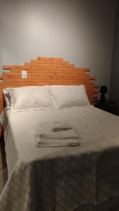Ένα ή περισσότερα κρεβάτια σε δωμάτιο στο Blumenau 602 perto da Vila Germânica, FURB e centro
