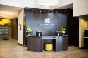 a lobby of a hotel with a reception desk at The Park Hotel London in London