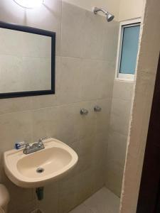 Kylpyhuone majoituspaikassa Hotel Posada San Juan