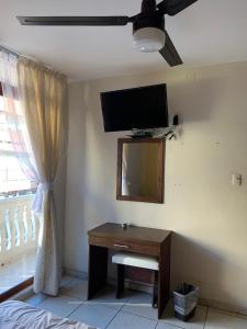 TV a/nebo společenská místnost v ubytování Hotel Posada San Juan