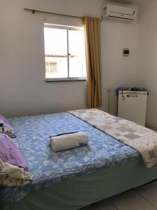 Кровать или кровати в номере Pousada Tiriri Guesthouse