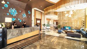 Lobbyn eller receptionsområdet på J7 Plaza Hotel