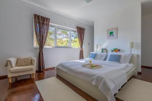 Postel nebo postele na pokoji v ubytování Villa Vrbnik