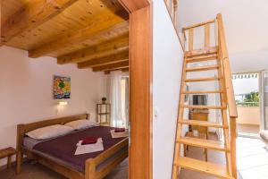Postel nebo postele na pokoji v ubytování Apartments Holiday near beach