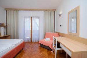 Posteľ alebo postele v izbe v ubytovaní Apartments Mirjana B