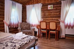 Ліжко або ліжка в номері Zolotoy Bereg Hotel