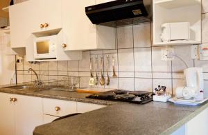 A kitchen or kitchenette at Lalapanzi Hotel & Conference Centre