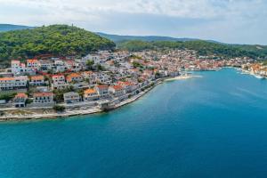 an aerial view of a town on a body of water at Apartments Darija in Pučišća