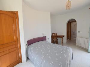 Postel nebo postele na pokoji v ubytování Casa la Barraca