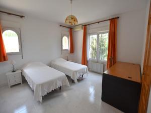 Postel nebo postele na pokoji v ubytování Casa la Barraca