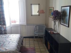 A bed or beds in a room at Can Bonshoms