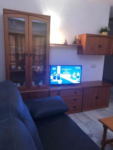 TV a/nebo společenská místnost v ubytování Mojacar Casa El Cantal Playa con vistas la Mar