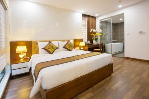 Ένα ή περισσότερα κρεβάτια σε δωμάτιο στο Nagila Boutique Hotel