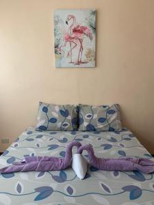 Postel nebo postele na pokoji v ubytování Brielles Travellers Inn