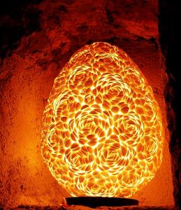 a close up of a glowing orange object at Boutique Hotel Placa in Krk