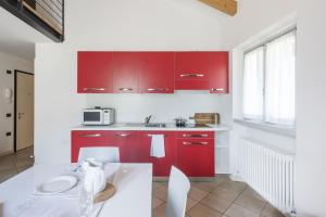 Kuchyň nebo kuchyňský kout v ubytování Residence La Vigna