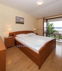 Postel nebo postele na pokoji v ubytování Apartment Danica