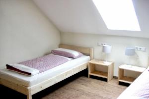 Postel nebo postele na pokoji v ubytování Ferienwohnung Ernle
