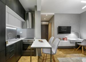 Kuchyňa alebo kuchynka v ubytovaní Olvios Luxury Suites