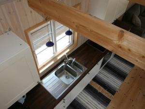 an overhead view of a sink in a tiny house at 4 person holiday home in Karreb ksminde in Karrebæksminde