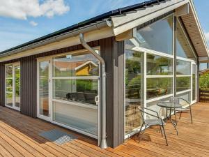 Balkón nebo terasa v ubytování Beachfront Bliss in Hejlsminde - By Traum Ferienwohnungen