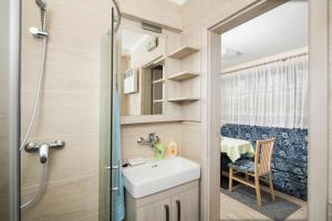 Kúpeľňa v ubytovaní Aquatherm Cottages Slovakia Liptov
