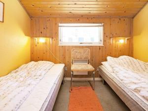 Lova arba lovos apgyvendinimo įstaigoje Holiday Home Spurvevænget II