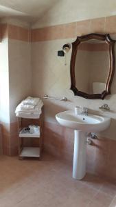 a bathroom with a sink and a mirror at Agriturismo Cascina Binelli in Dogliani +69 photos