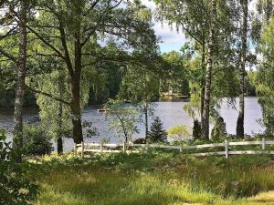 Um jardim em 6 person holiday home in KYRKHULT