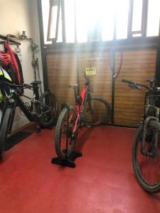 a group of bikes parked in a garage at hostal trevol in Torelló
