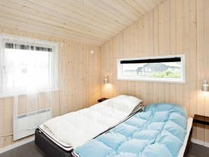 Krevet ili kreveti u jedinici u okviru objekta Holiday Home Søgårdsvej IV