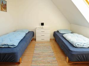 Tempat tidur dalam kamar di Apartment Faaborg II