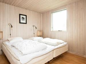 Postel nebo postele na pokoji v ubytování Holiday home Oksbøl XXXI