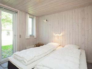 Postel nebo postele na pokoji v ubytování 8 person holiday home in Hurup Thy-By Traum
