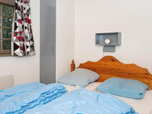 Ένα ή περισσότερα κρεβάτια σε δωμάτιο στο Holiday Home Horns Bjerge II