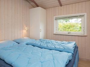 Postel nebo postele na pokoji v ubytování 8 person holiday home in Sjølund-By Traum + 19 fotografií