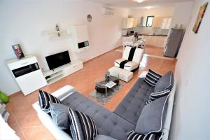 an aerial view of a living room with a couch at Villa Allegro in Sukošan
