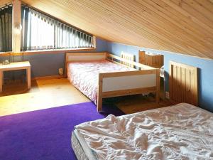 Postel nebo postele na pokoji v ubytování Holiday home Beddingestrand