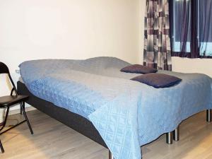 מיטה או מיטות בחדר ב-Apartment FARSUND