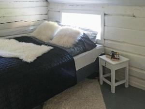Postel nebo postele na pokoji v ubytování 6 person holiday home in Bjarkøy