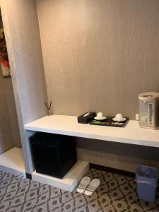 Kuchyň nebo kuchyňský kout v ubytování Chi Shing Hai Hotel