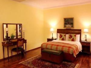 Voodi või voodid majutusasutuse The LaLit Grand Palace Srinagar toas