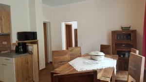Televízia a/alebo spoločenská miestnosť v ubytovaní Appartement Juns