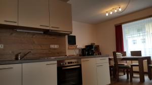 Kuchyňa alebo kuchynka v ubytovaní Appartement Juns