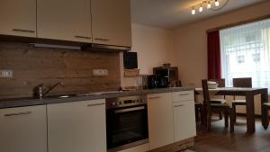 Kuchyňa alebo kuchynka v ubytovaní Appartement Juns