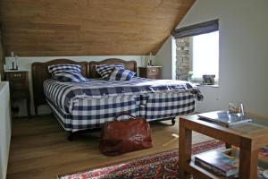 Postel nebo postele na pokoji v ubytování B&B Le Tapis Rouge