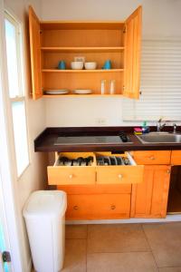 A kitchen or kitchenette at The Sands Hotel