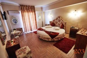 Postel nebo postele na pokoji v ubytování Atlantic Hotel